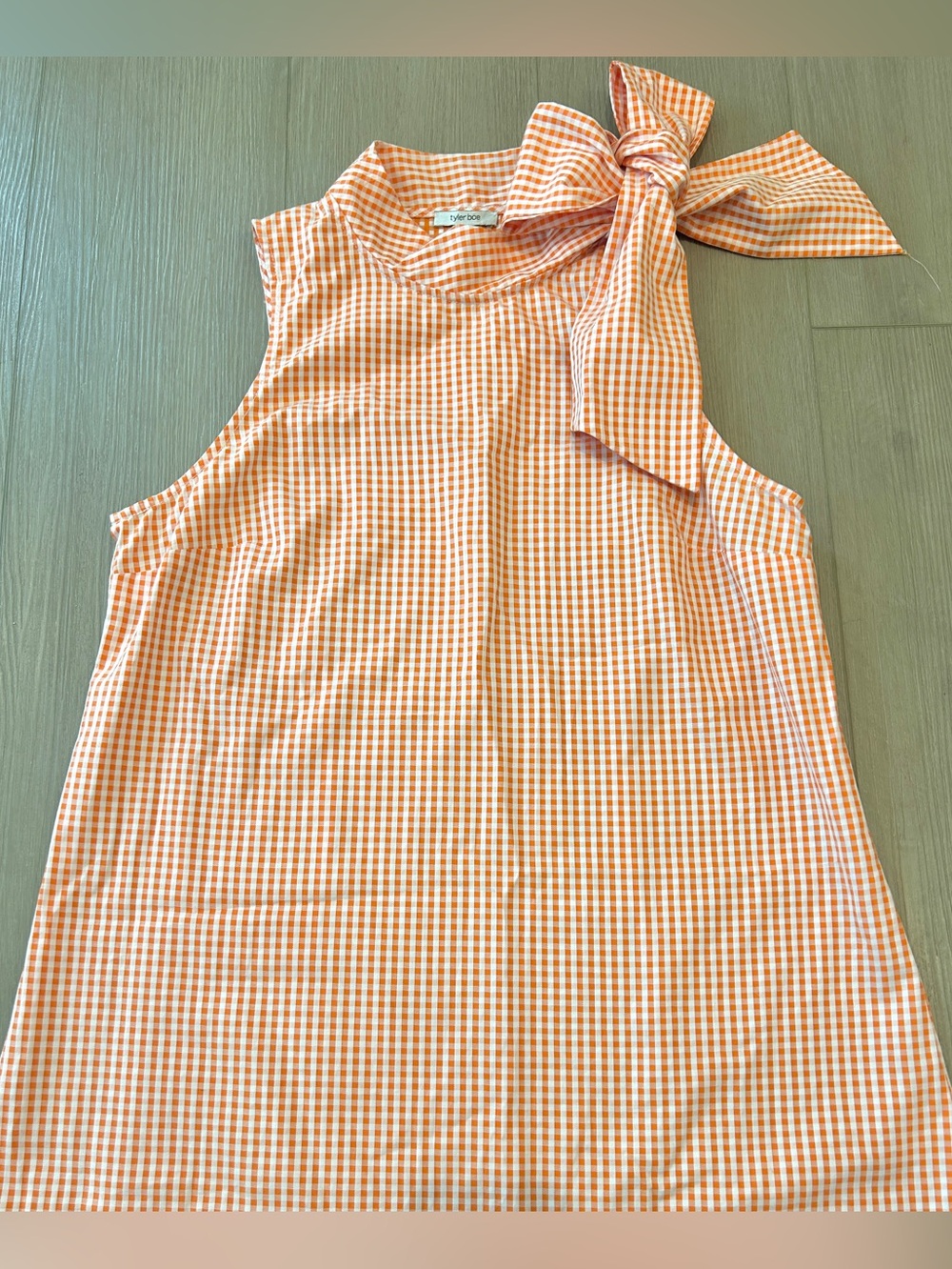 Tyler Boe Ella Top SZ Medium
Orange white Gingham with tie.  Like new!